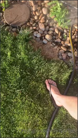 fityoginina doing a little watering and enjoying the feel cool spray s 300140493 ( 149.3 MB )